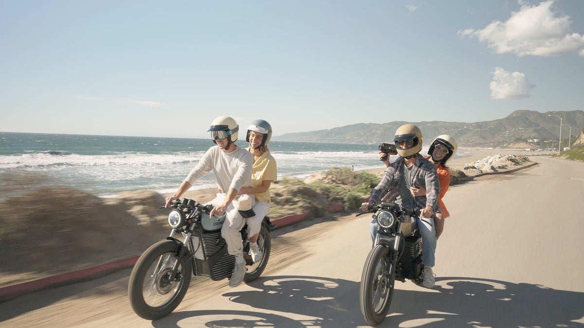 Four riders on Beachman Aviators on a coastal road